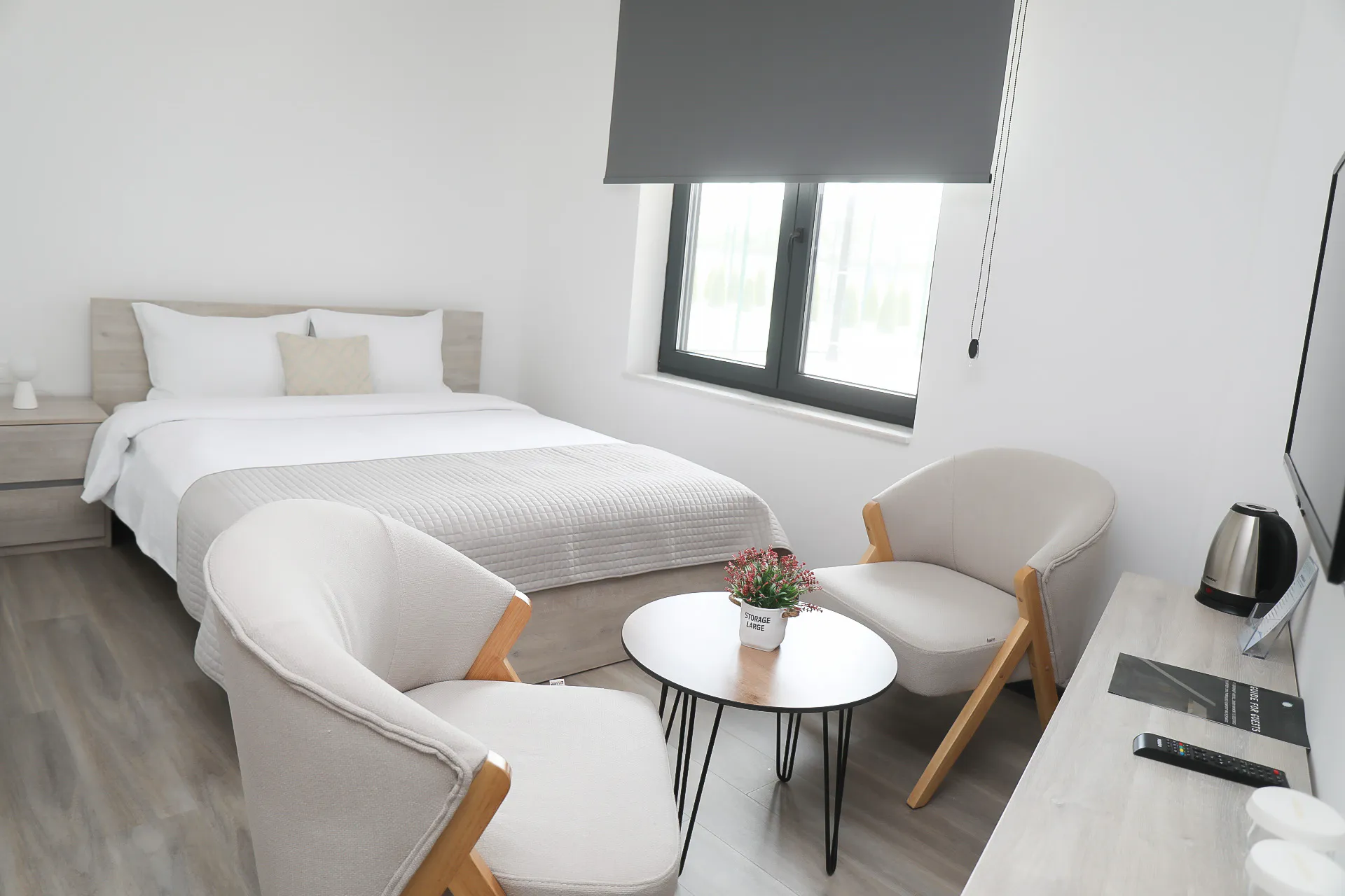 The Deluxe Double Room with an extra bed, made up for three