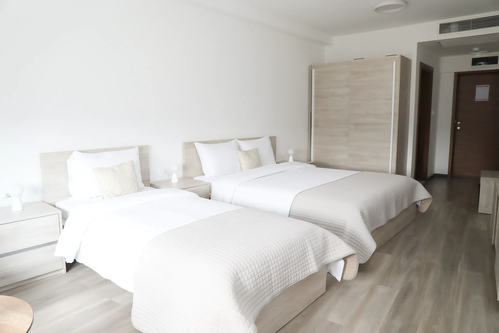 The Deluxe Double Room with an extra bed, made up for three